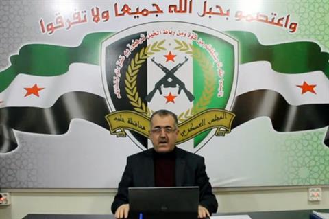 This YouTube grab shows Col. Abdel-Jabbar Ukaidi, as he announces his resignation Sunday, Nov. 3, 2013. (The Daily Star/YouTube grab) Read more: http://dailystar.com.lb/News/Middle-East/2013/Nov-03/236696-top-syrian-rebel-commander-announces-resignation.ashx#ixzz2jiwKcGtm (The Daily Star :: Lebanon News :: http://www.dailystar.com.lb)